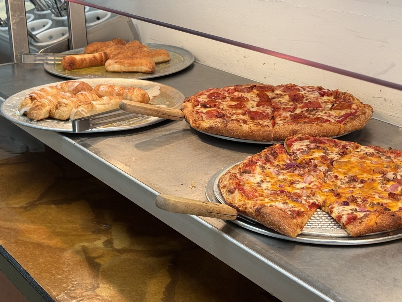 Fresh B.C. Pizza pizzas with bread stix.